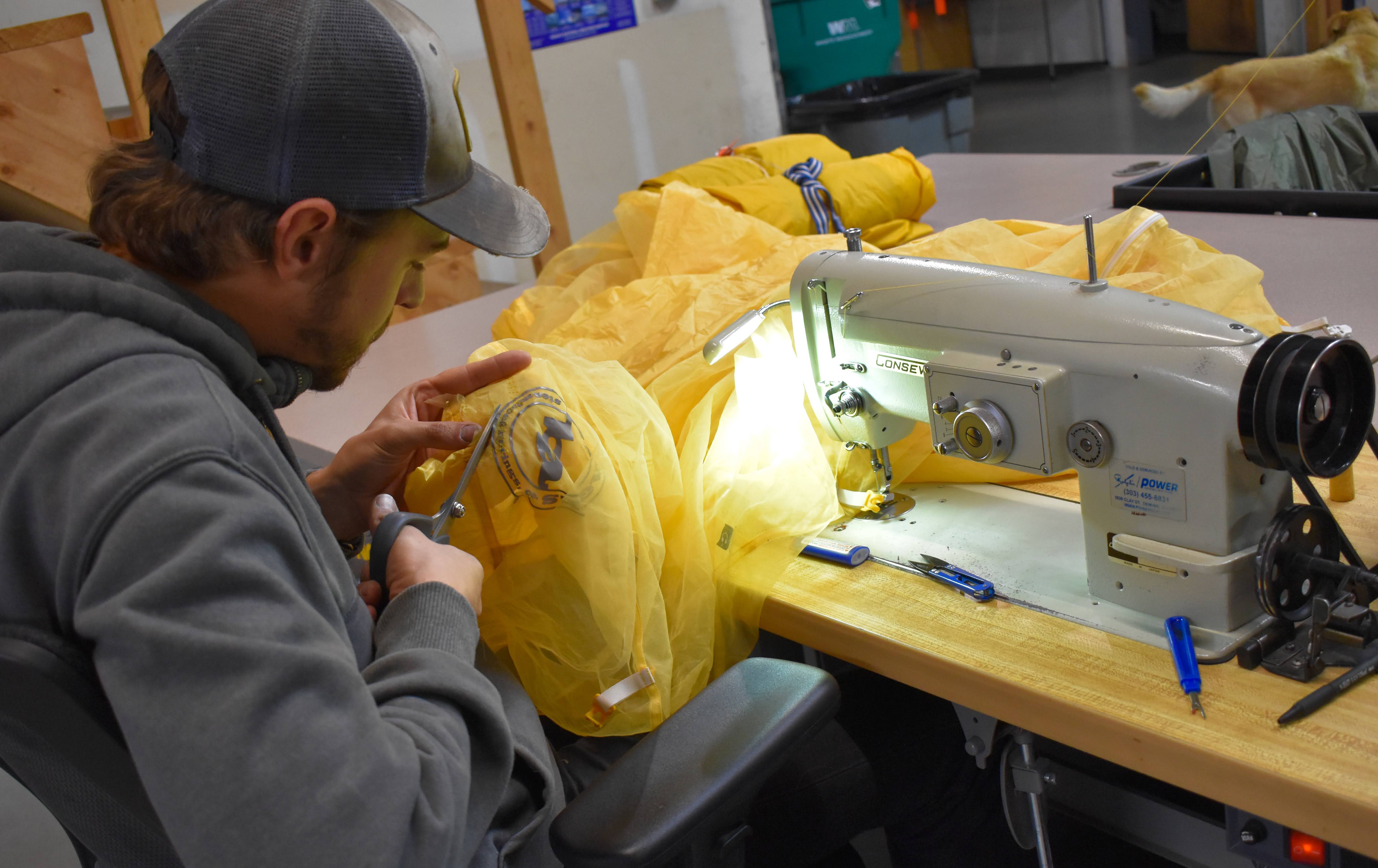 fixing a big agnes tent with a sewing machine