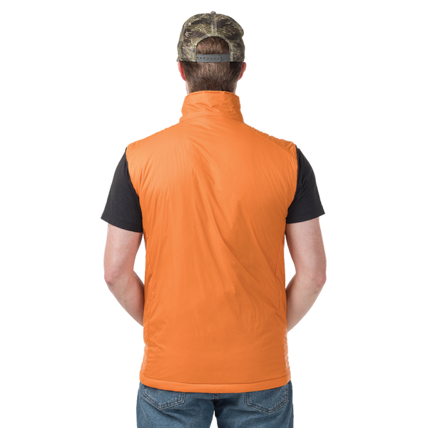 Person wearing an orange vest over a black shirt with a camouflage cap on a white background