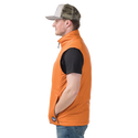 Side view of man wearing orange insulated vest with Big Agnes logo
