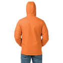 Back view of man standing in burnt orange jacket with hood up
