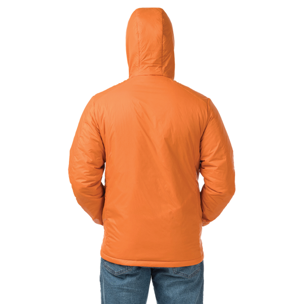 Back view of man standing in burnt orange jacket with hood up