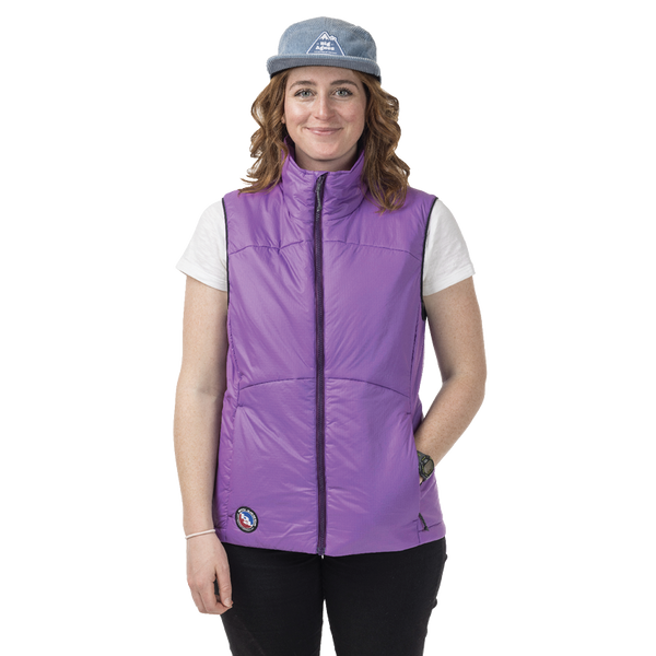 Woman wearing purple vest