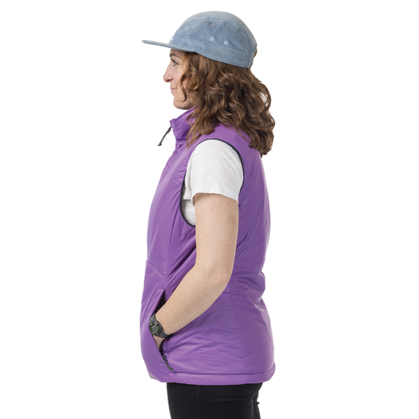 Side view of woman wearing purple vest