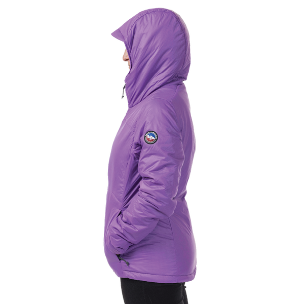 Side view of woman wearing purple hooded jacket