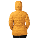Person wearing a mustard yellow quilted jacket on a white background