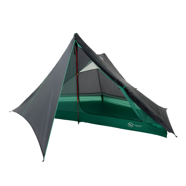 The Big Agnes String Ridge VST 1.5, a green and black ultralight backpacking tent, features a mesh upper, rainfly, and open-front triangular design supported by trekking poles. It's displayed on a white background.