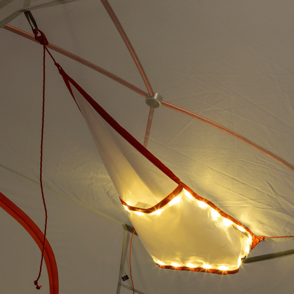 mtnGLO Tent Gear Loft Fastened To Tent Ceiling With Lights Lit Up